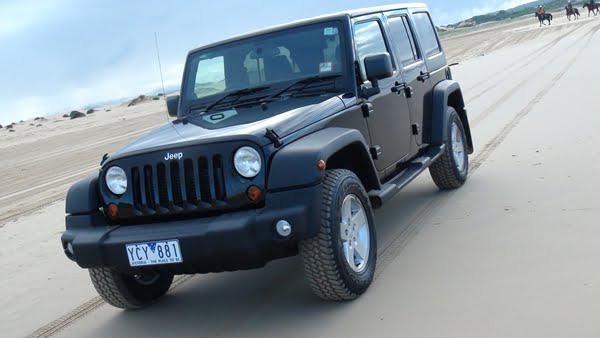 2011 Jeep Wrangler Unlimited front Side