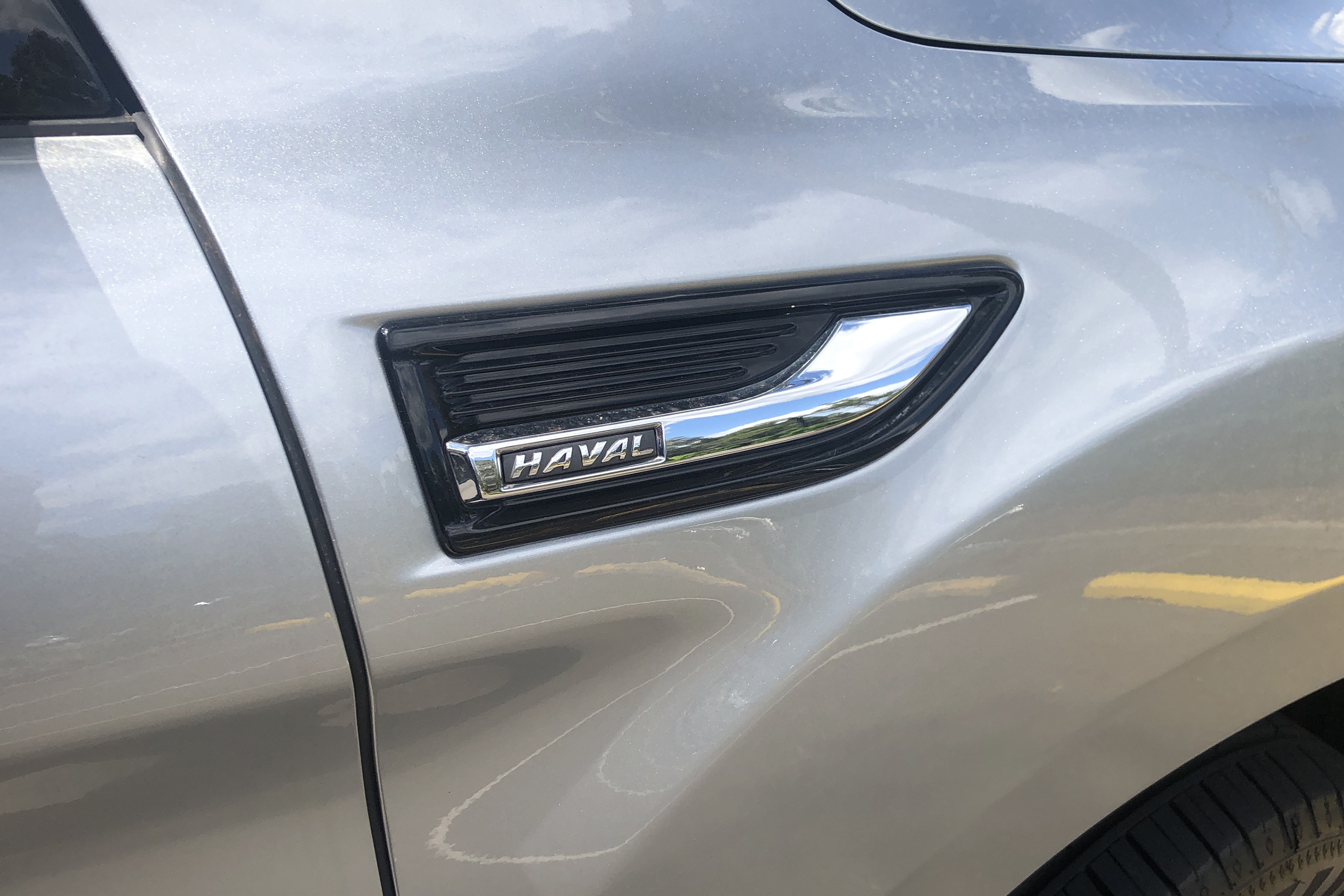 Haval logo on side of car cropped