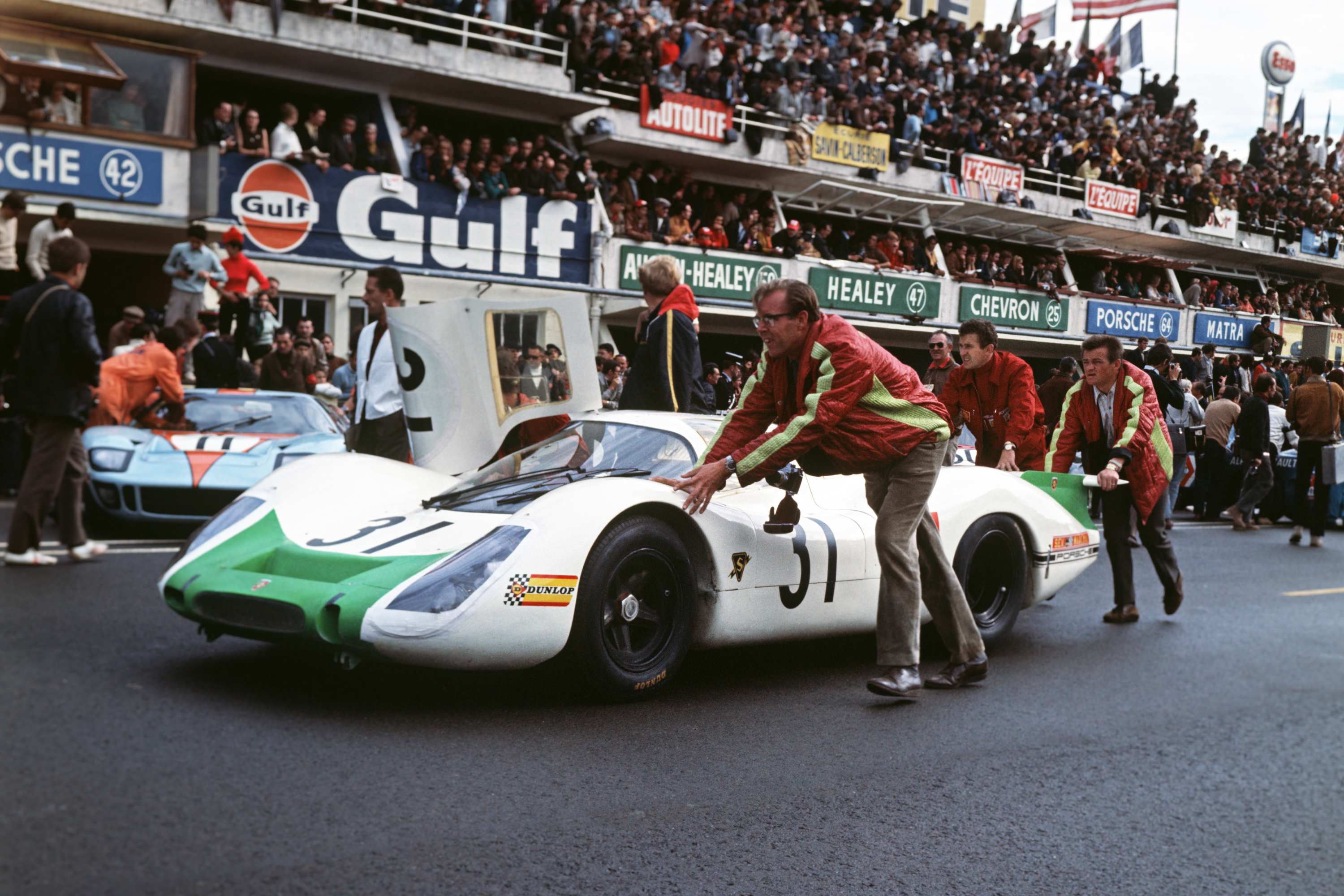 24 Hours of Le Mans No. 31 Jo Siffert and Hans Herrmann with Porsche 908 LH Coupé at the rear Hans Mezger.