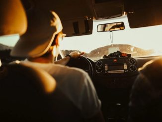Man driving into sunlight
