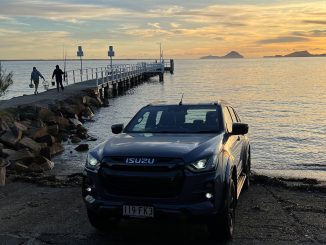 2023 Isuzu D-Max X-Terrain front quarter on boat ramp sunrise